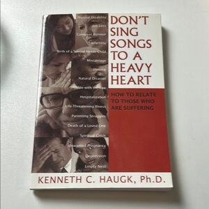 Don't Sing Songs to a Heavy Heart Paperback Book by Kenneth C. Haugk, Ph.D.